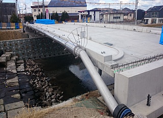 改良26移設11号大川改修工事に伴う配水管移設工事